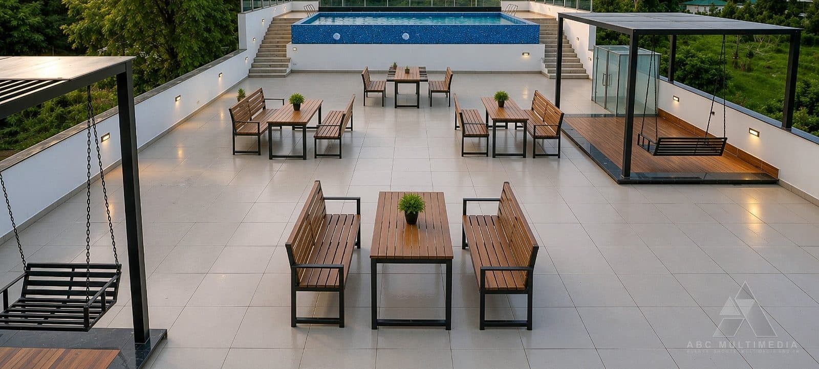 Destinn's rooftop terrace with benches and the infinity pool beyond